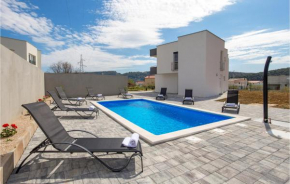 Nice home in Rab with Outdoor swimming pool, WiFi and 4 Bedrooms